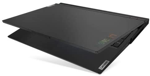 Un ordenador portátil Lenovo Legion negro, parcialmente abierto, mostrando el teclado.