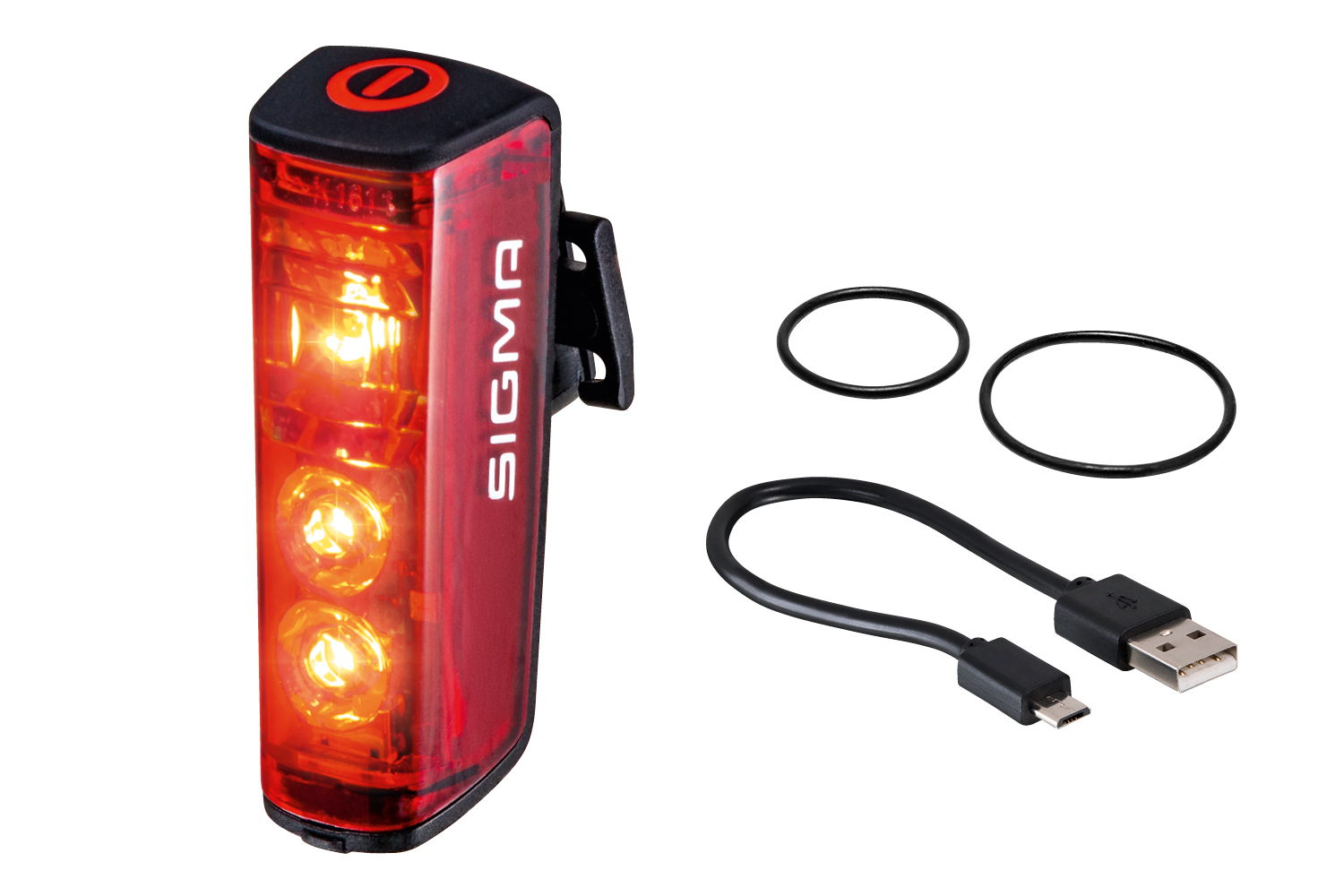 Rotes Fahrradlicht, schwarzes USB-Kabel und zwei schwarze Gummiringe.