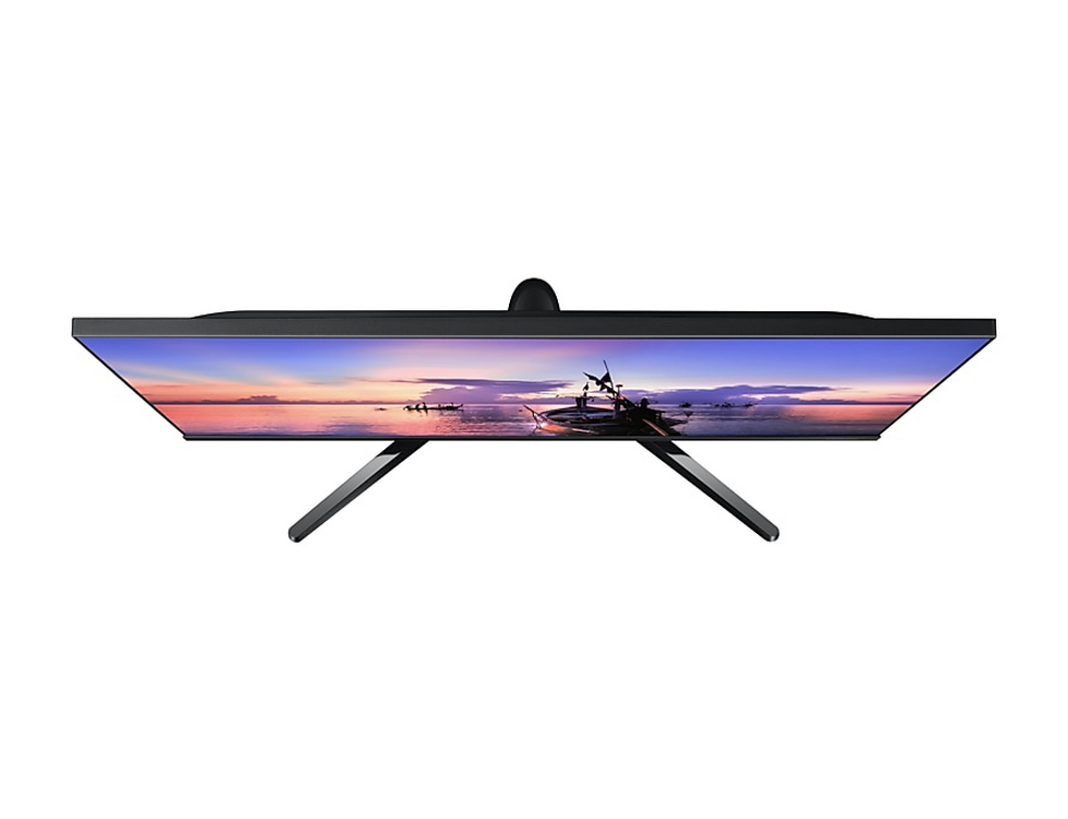 Vista superior de un monitor con bisel delgado. La pantalla muestra un atardecer sobre el agua.
