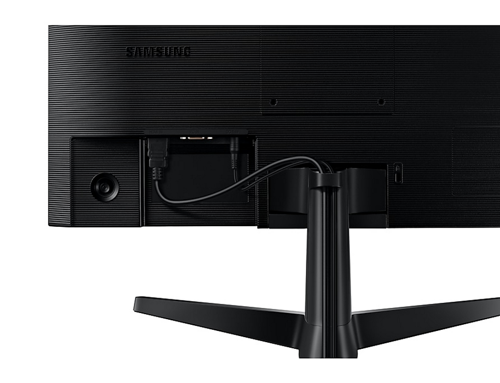 Parte trasera de un monitor negro con cables conectados.