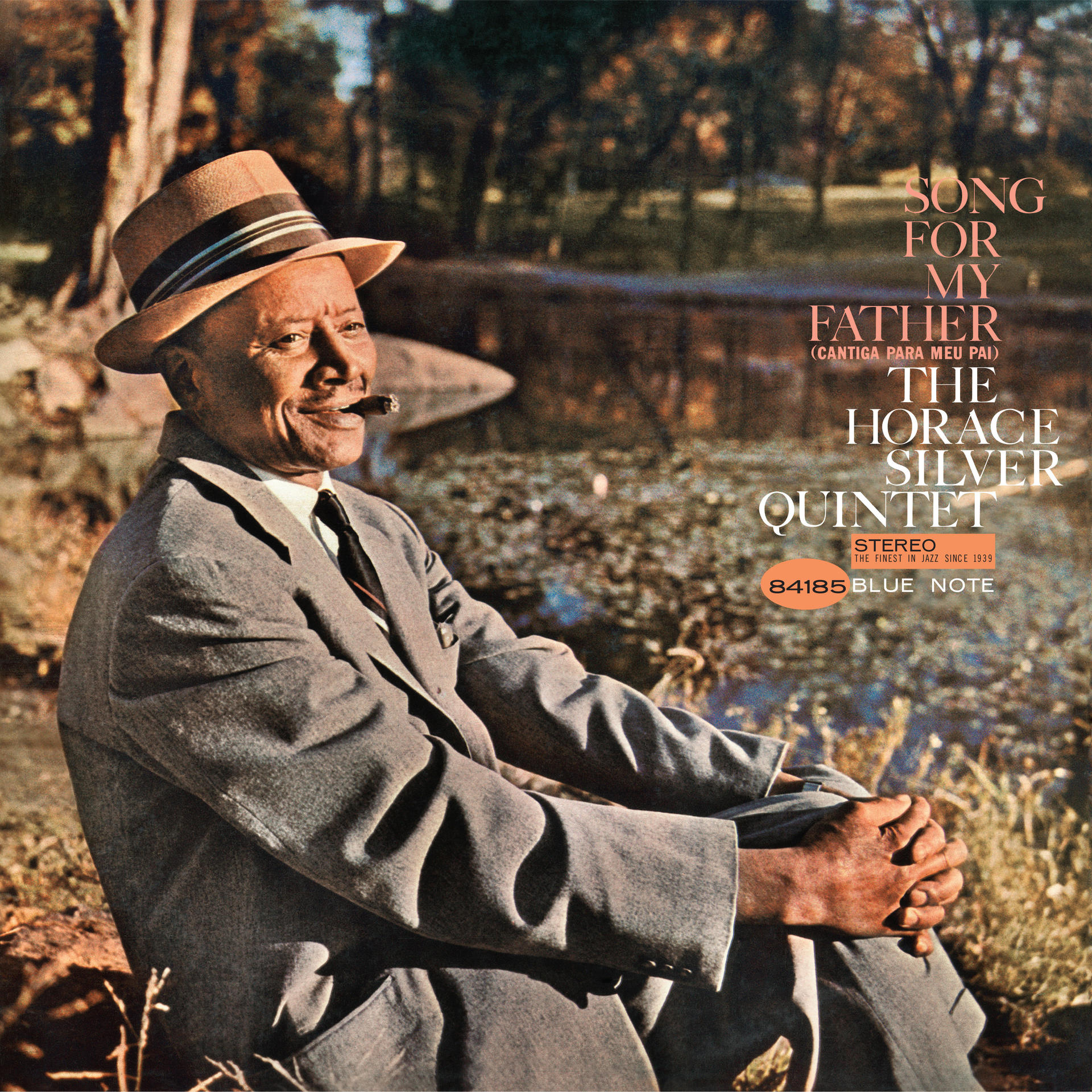 Albumcover: Mann mit Hut raucht, sitzt am Wasser. Text 'Song For My Father' und Künstlerdetails.