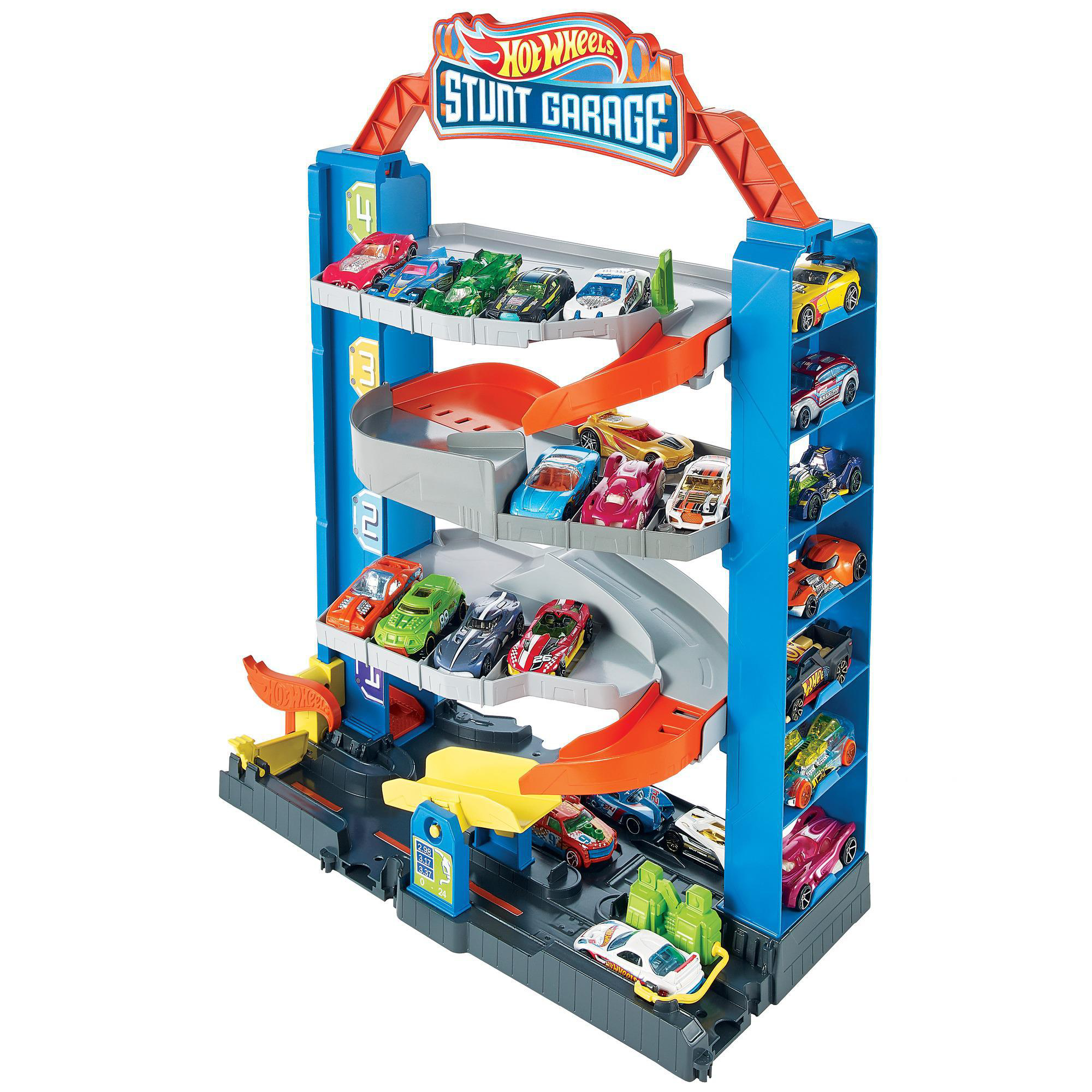 Ein Hot Wheels Stunt Garage Spielzeug mit mehreren Ebenen und Rampen. Verschiedene Spielzeugautos parken und rasen die Rampen hinunter.