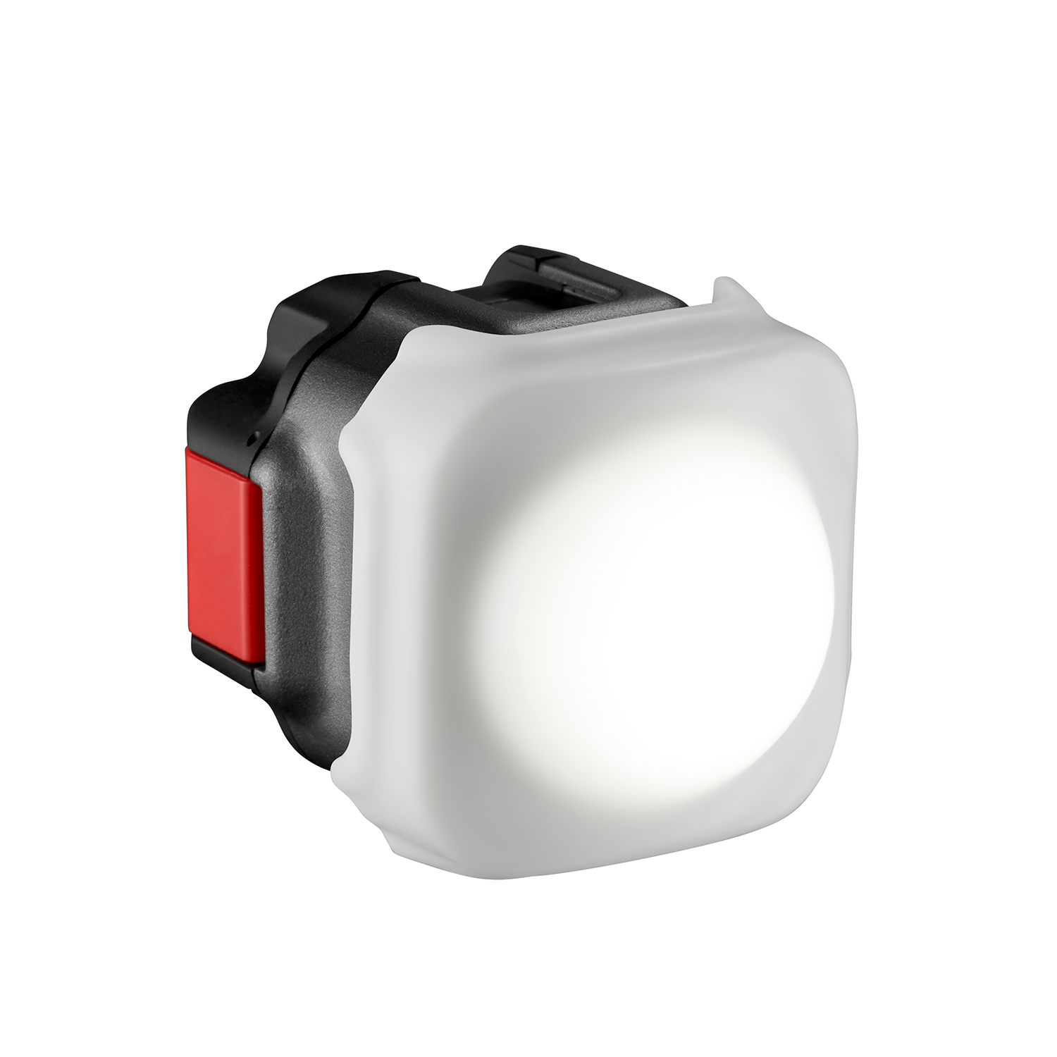 A small, square, black and red light with a white light on the front. The background is white.