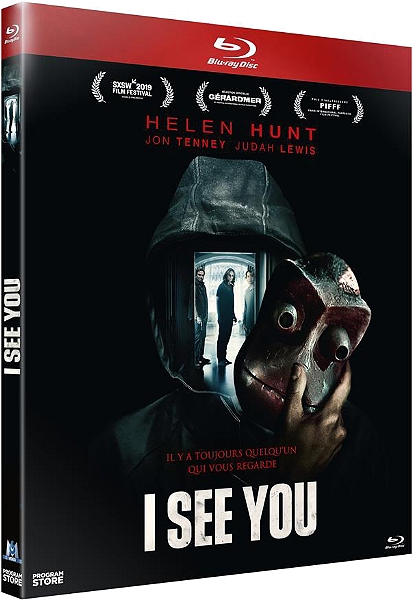Boîtier Blu-ray de 'I See You' avec une figure masquée et trois personnes.