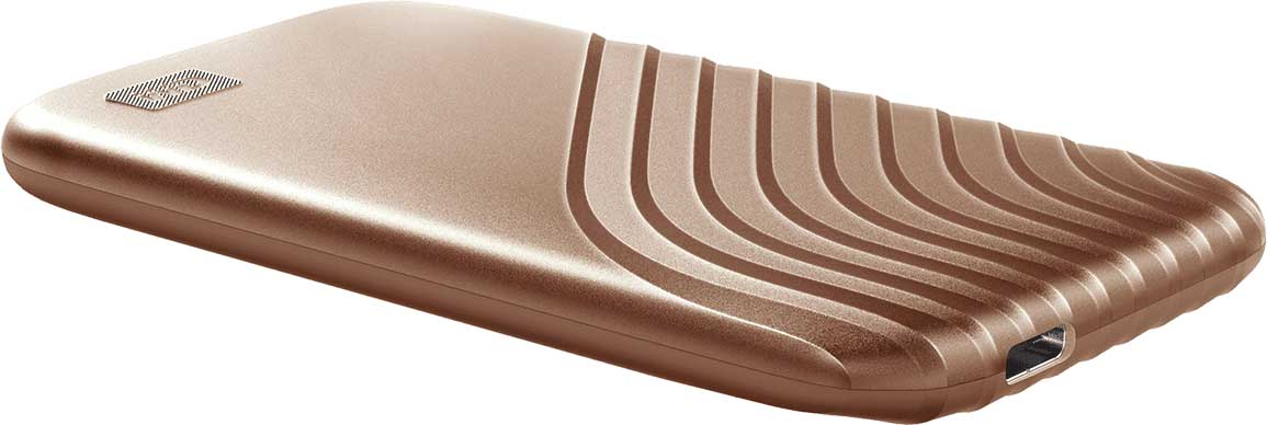 Bronskleurige externe harde schijf met een gestructureerd oppervlak en een USB-poort.