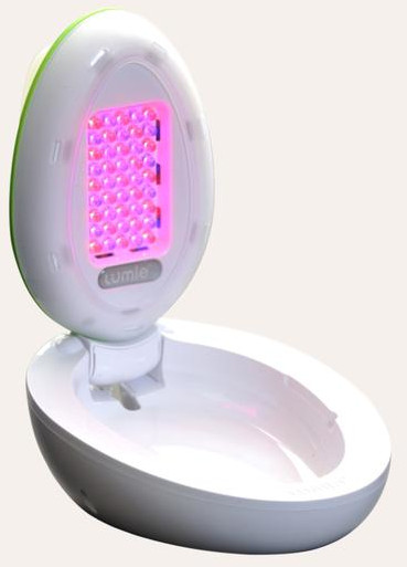 Appareil de luminothérapie blanc et vert en forme d'œuf, ouvert montrant des lumières rouges.