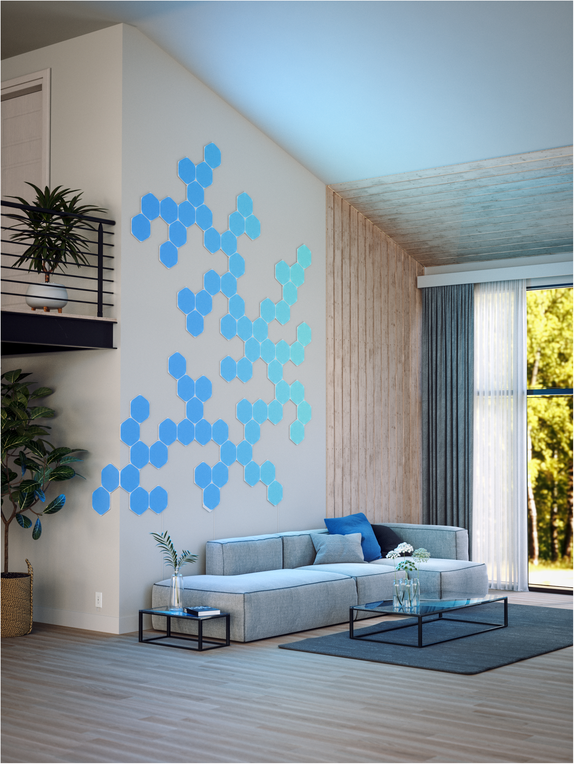 Wohnzimmer mit blauen Hexagon-Lichtern an der Wand. Ein Sofa, Couchtisch und Pflanzen sind vorhanden.