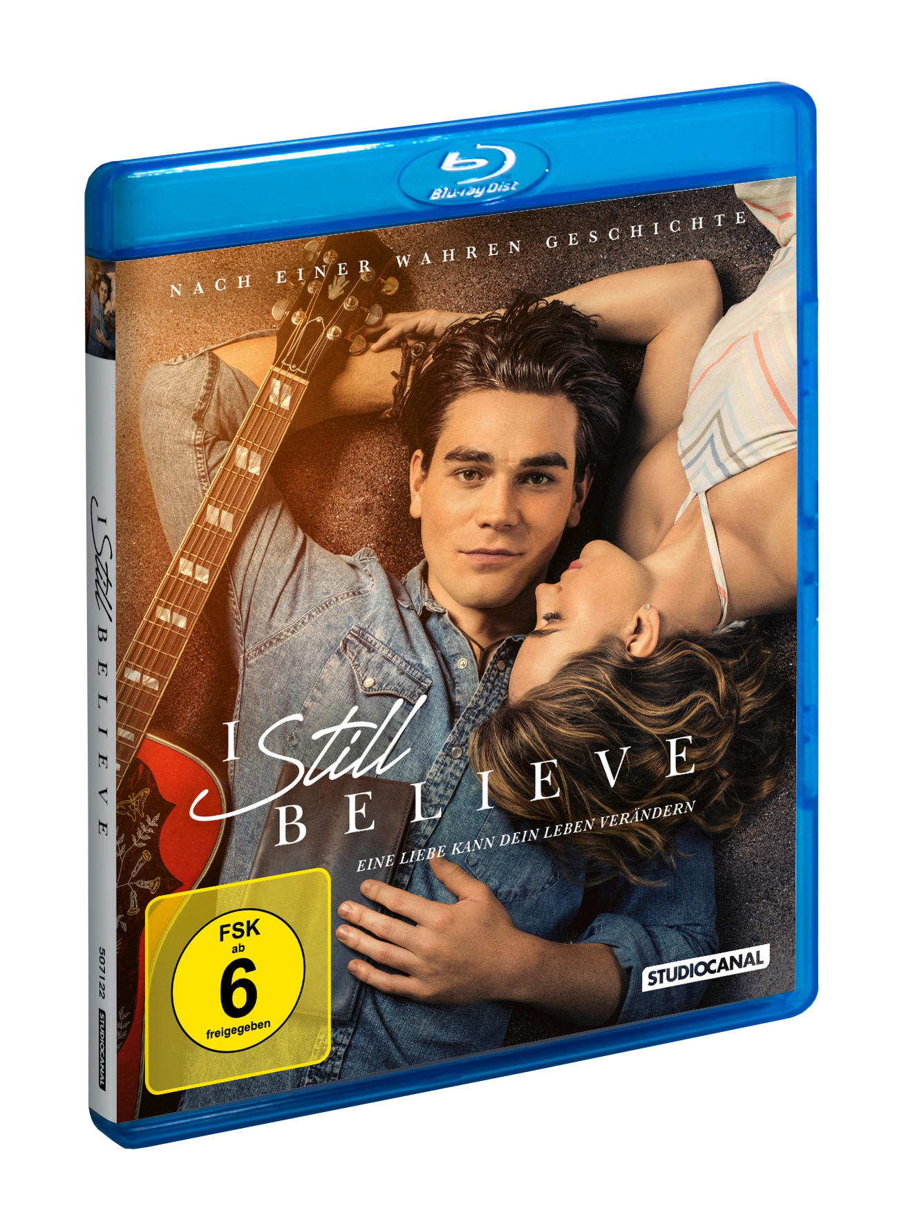 Blu-ray-Disc-Cover mit einem liegenden Paar und Gitarre, Titel 'I Still Believe'.