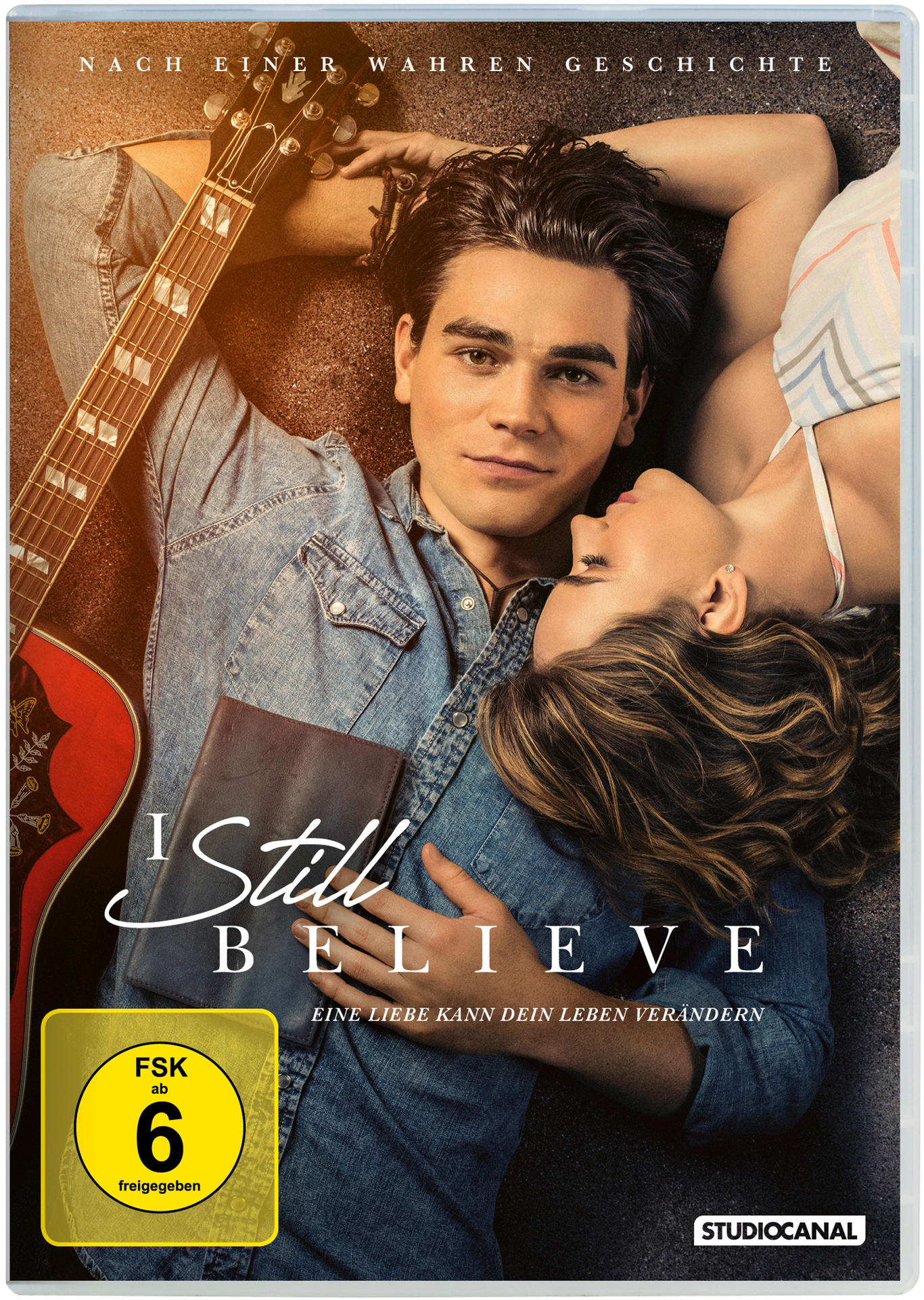 Filmposter: Paar liegt im Bett, Gitarre, Filmtitel.