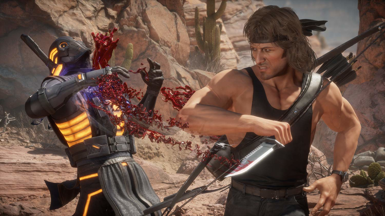 Rambo combatte contro un robot, spruzzi di sangue. Sfondo desertico, Rambo ha un coltello.