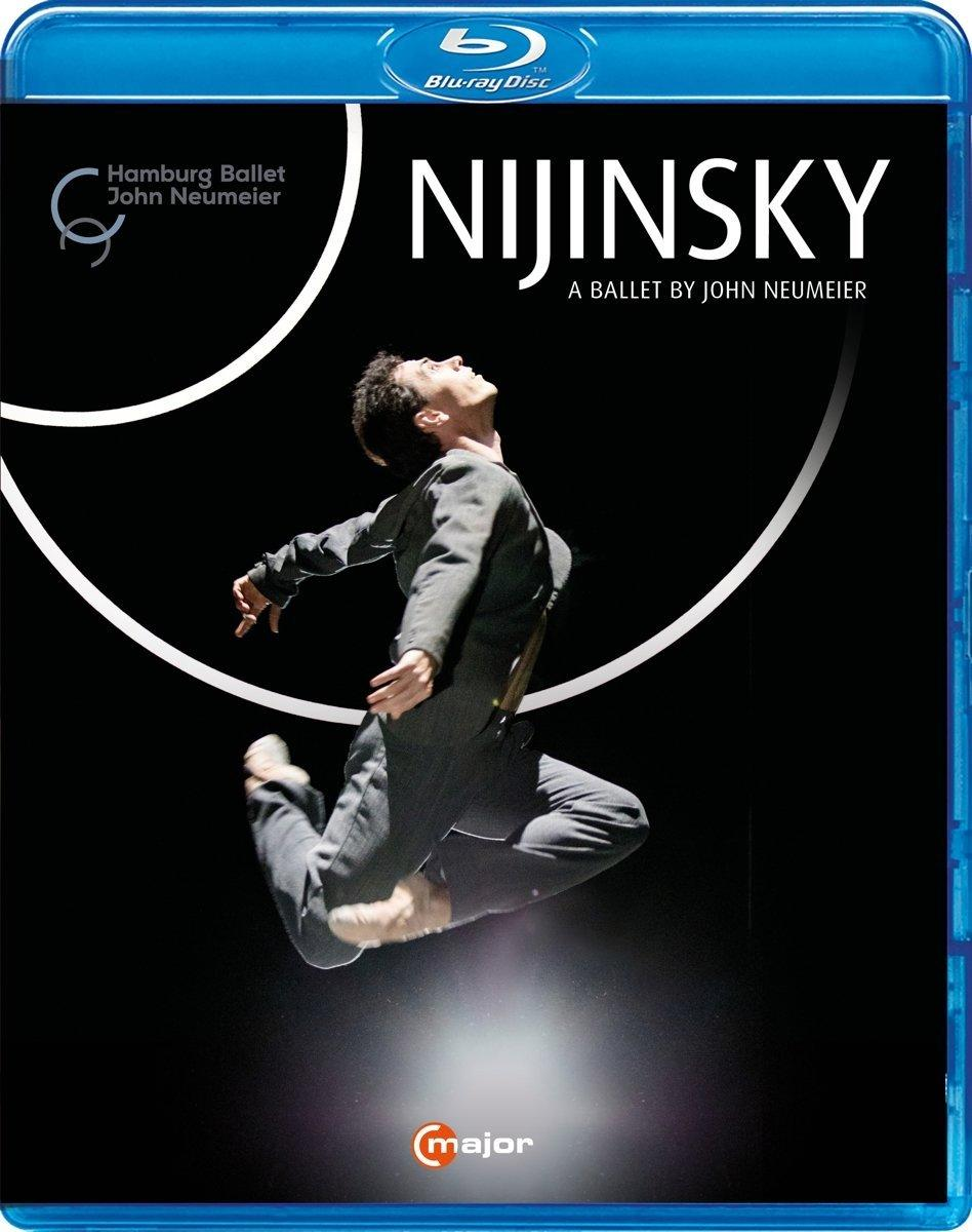 Blu-ray-Disc-Hülle mit einem Tänzer in dunklem Anzug, der vor schwarzem Hintergrund springt.