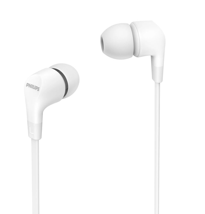 Beyaz bir arka plan üzerinde beyaz Philips kulaklıklar. Bir kulaklık odaklanmış.