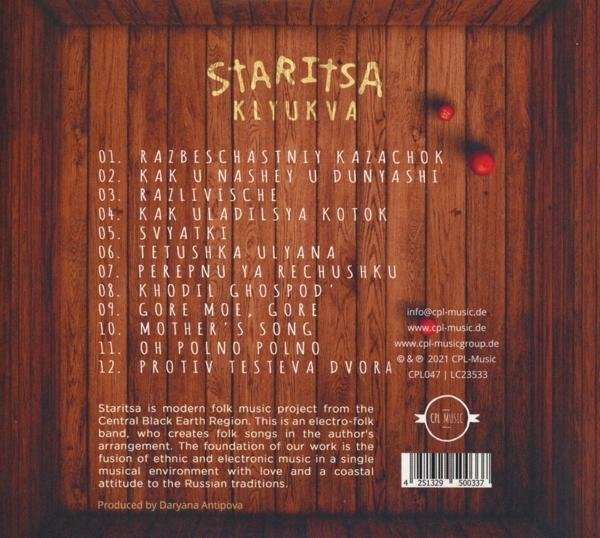 CD-Cover mit russischem Text und einem Holzuntergrund. Es gibt einige rote Beeren.