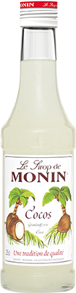 Eine Flasche Monin Kokosnuss-Sirup. Das Etikett zeigt Kokosnuss-Bilder und den Markennamen.