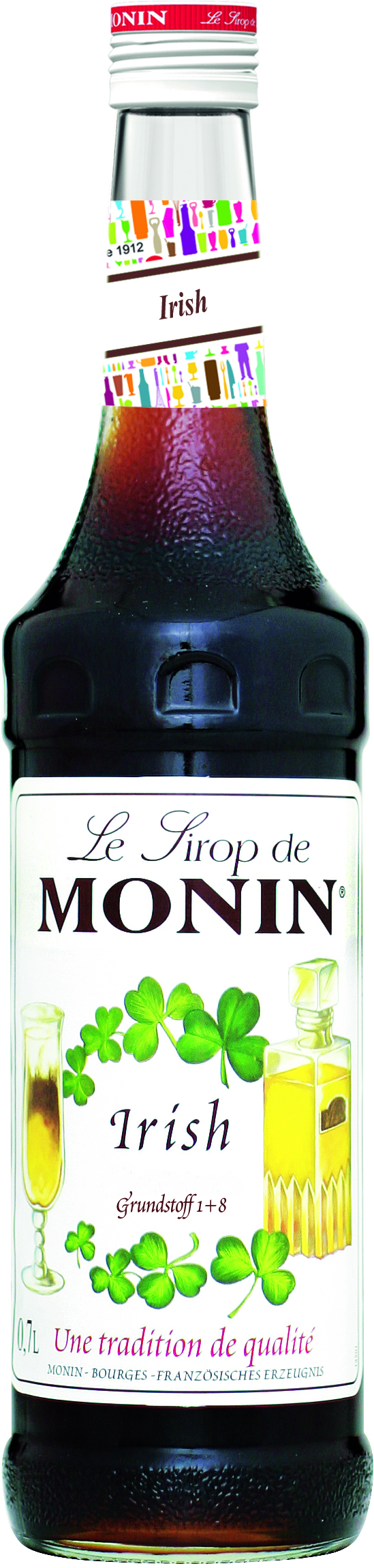 Monin Irish Sirupflasche. Grüne Kleeblätter und eine Zeichnung eines Glases mit dem Sirup.