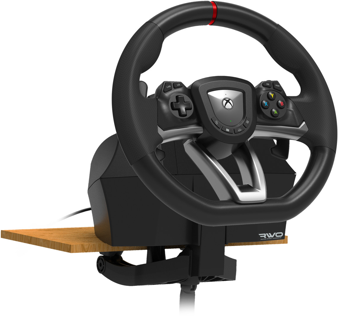 Un volant noir et des commandes pour une console de jeu.