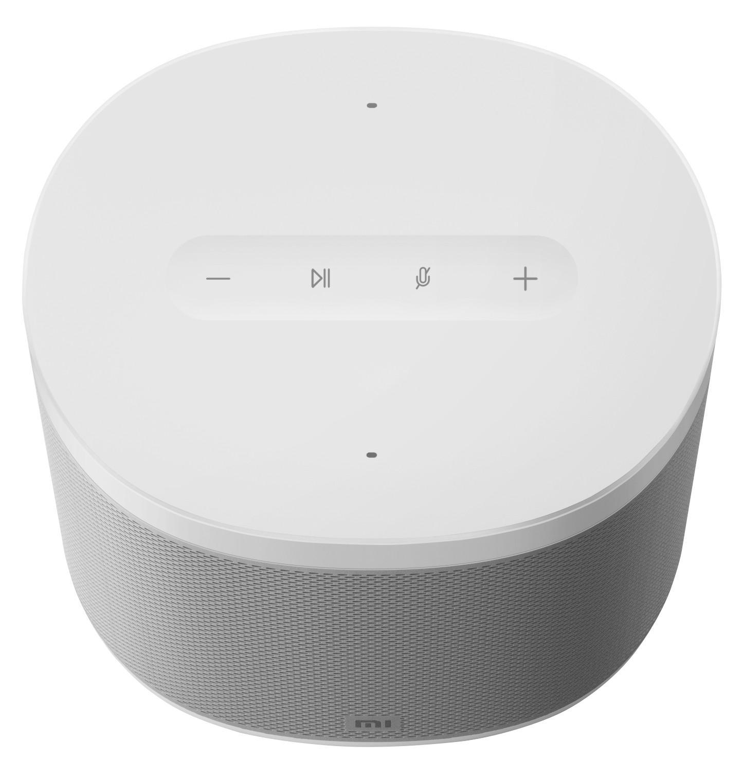 Weißer Lautsprecher mit Knöpfen oben, grauen Mesh-Seiten und weißem Hintergrund.