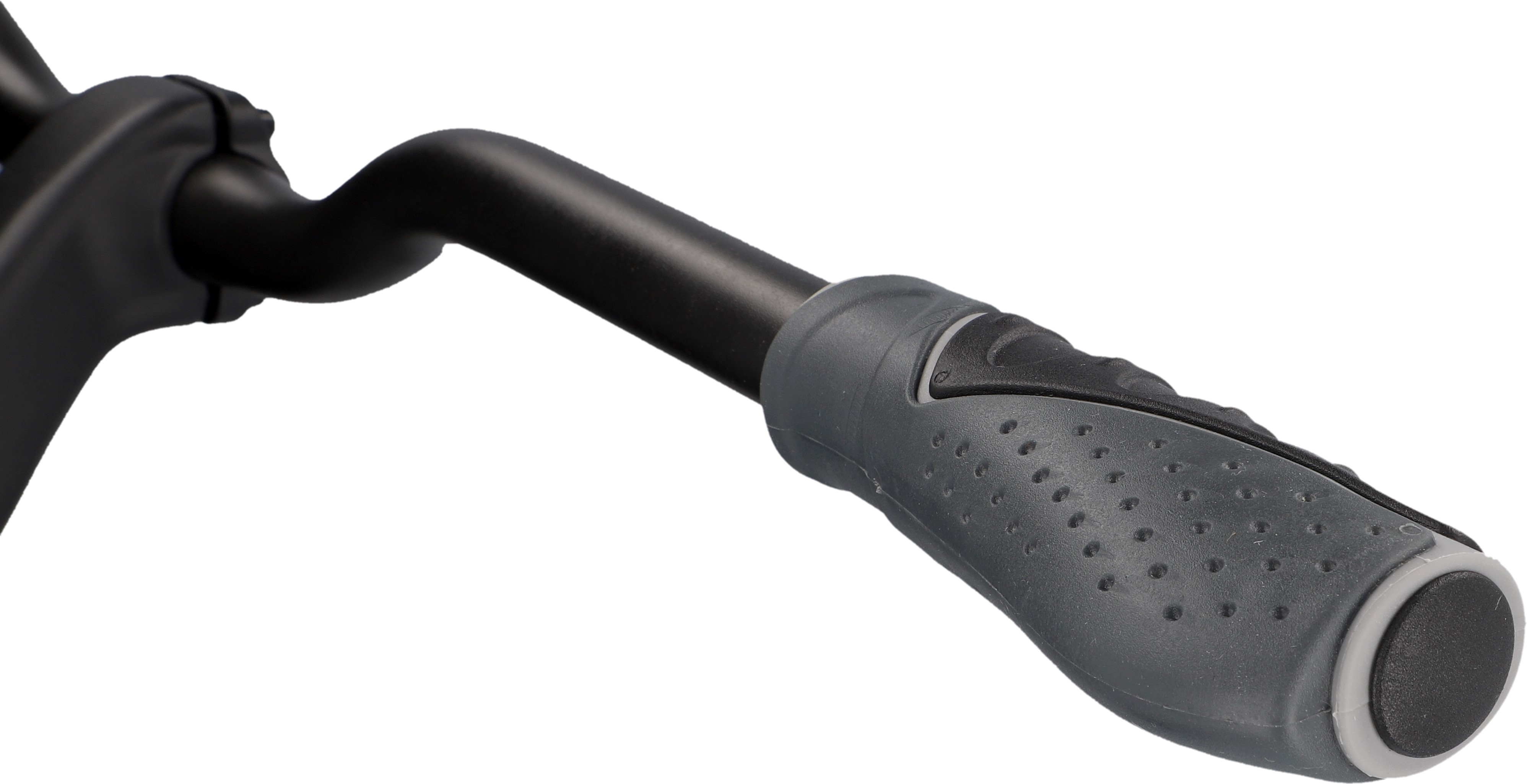 Schwarzer Fahrradlenker. Der Lenker hat einen grauen Griff mit Perforationen. Ein schwarzer Vorbau erstreckt sich.