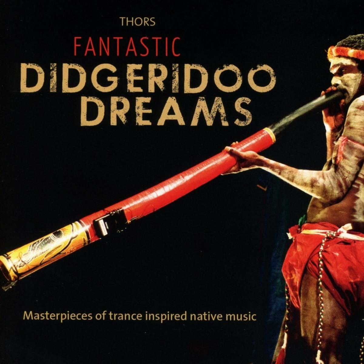 Mann spielt Didgeridoo. Text: Fantastic Didgeridoo Dreams, Meisterwerke der Trance-Musik.