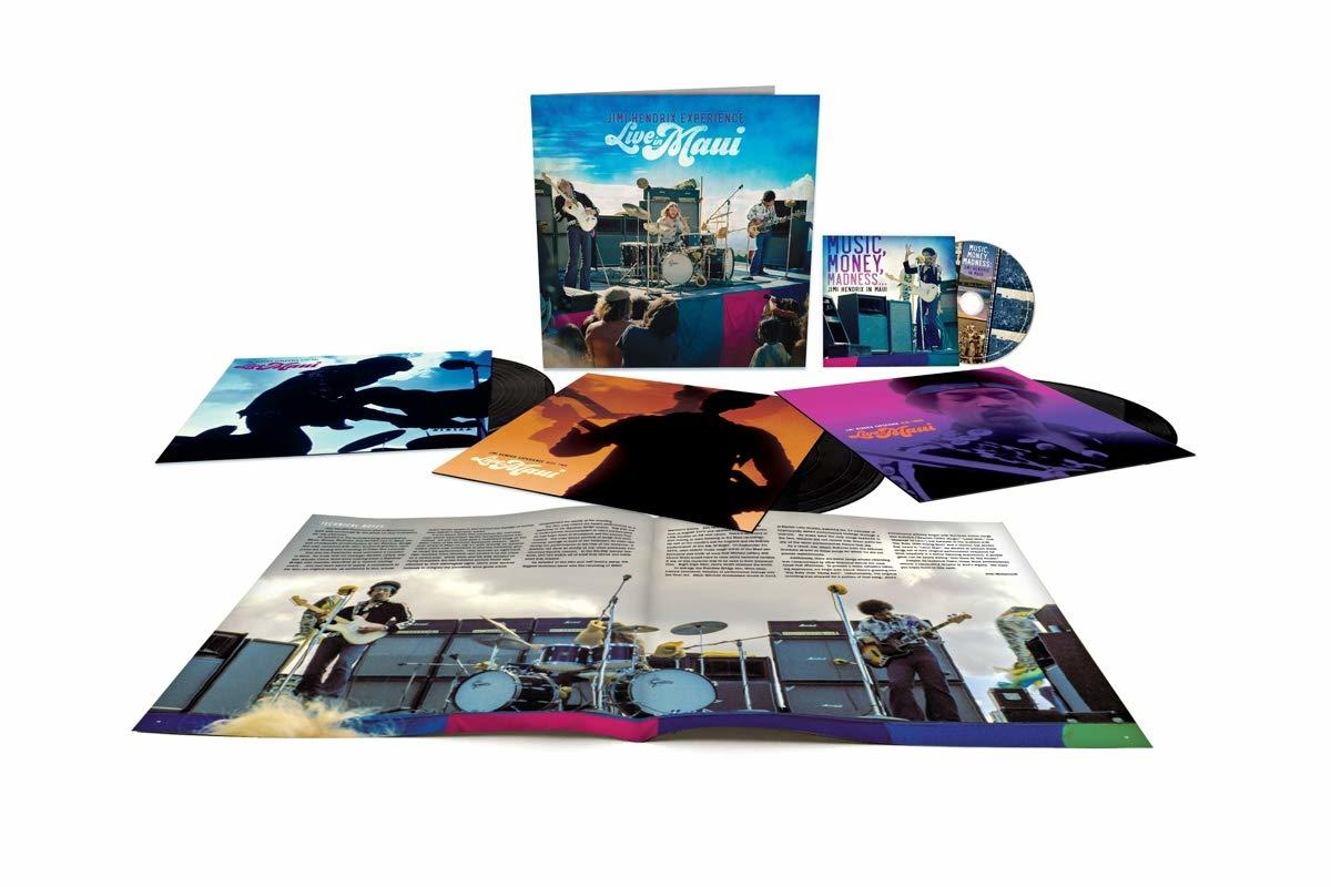 Eine Sammlung von Schallplatten und einer CD, alle im Zusammenhang mit einem Live-Musik-Album. Das Cover ist sichtbar.