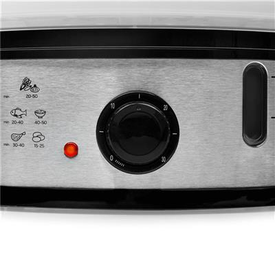 Pannello di controllo di un vaporiera per alimenti. Un quadrante nero per impostare l'ora e una luce rossa accesa.