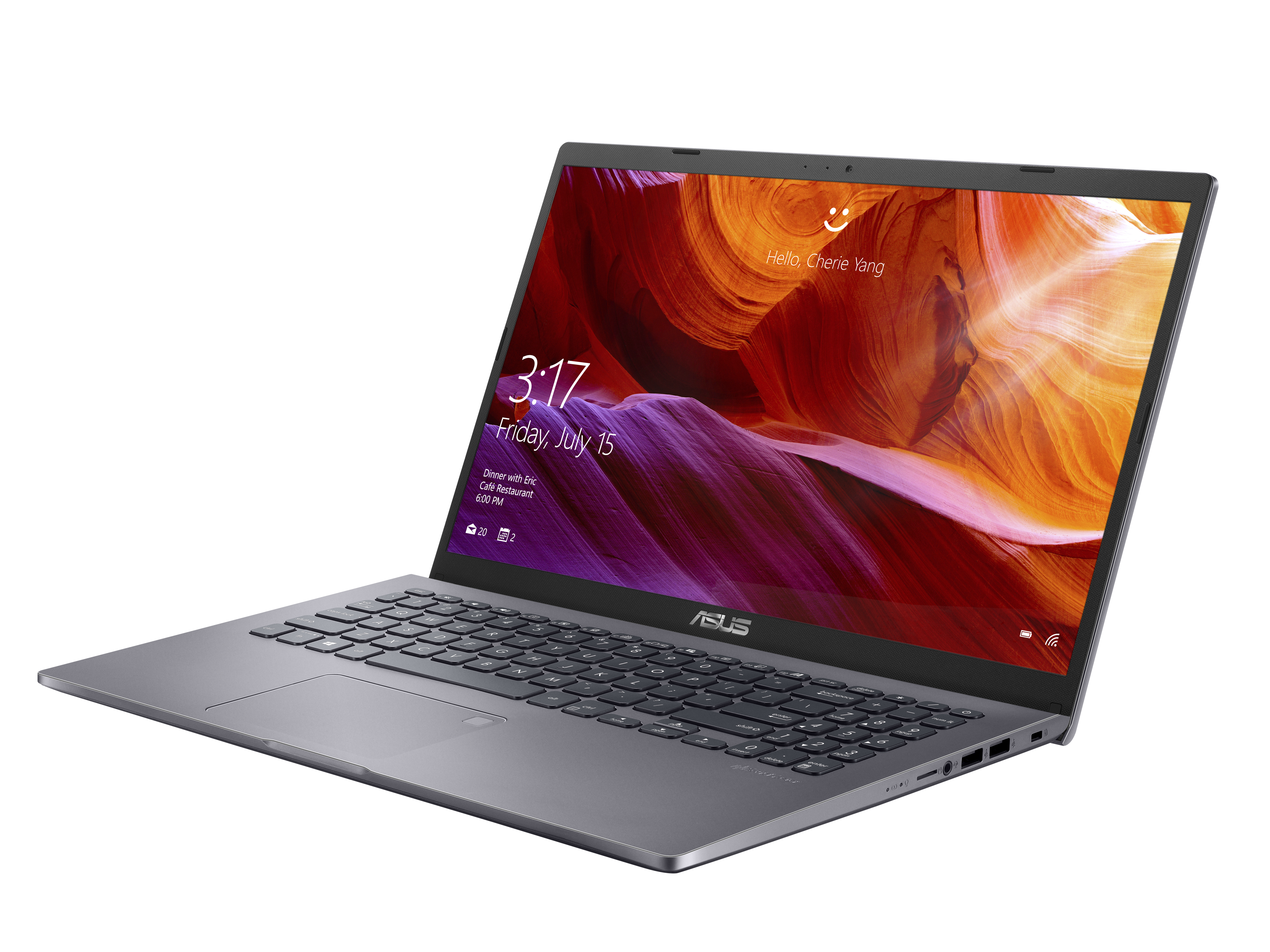 Ein grauer ASUS-Laptop ist auf einer weißen Oberfläche geöffnet und zeigt einen Sperrbildschirm mit Canyon-Hintergrundbild.