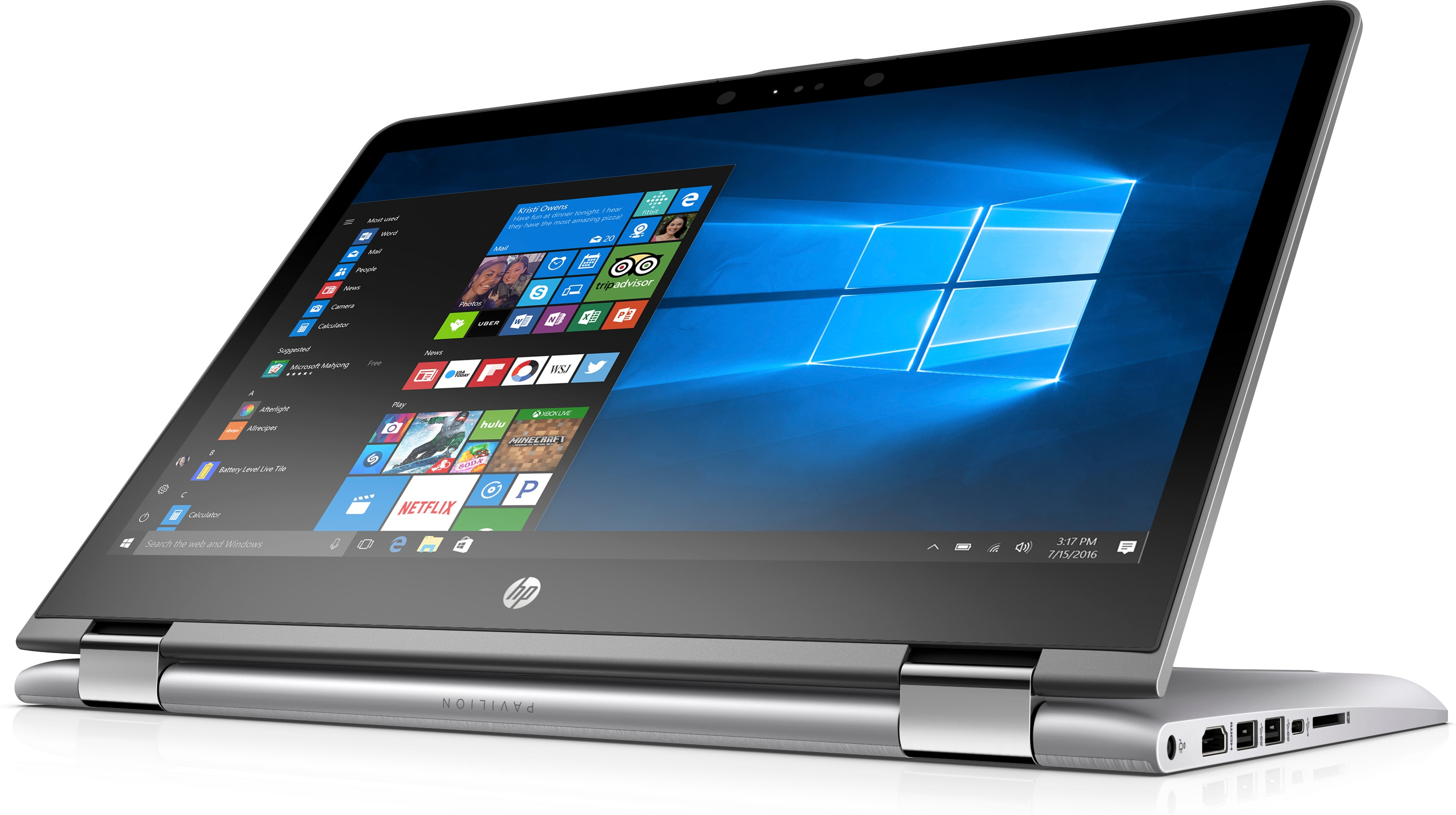 Ein silberner HP Laptop in Zeltstellung zeigt den Windows 10 Startbildschirm mit blauer Hintergrundgrafik.