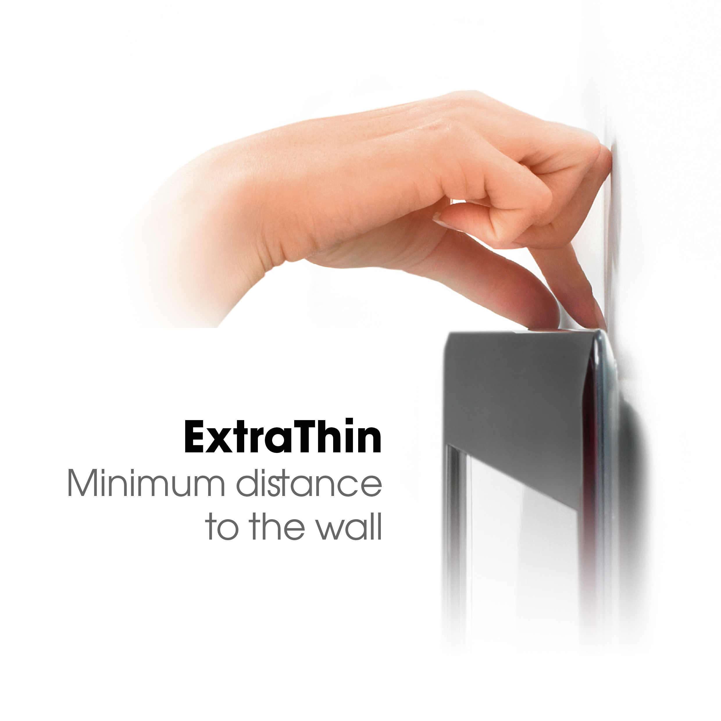 Eine Hand berührt den Rand eines Panels, nah an einer Wand. Der Text lautet 'ExtraThin, Minimum distance to the wall'.