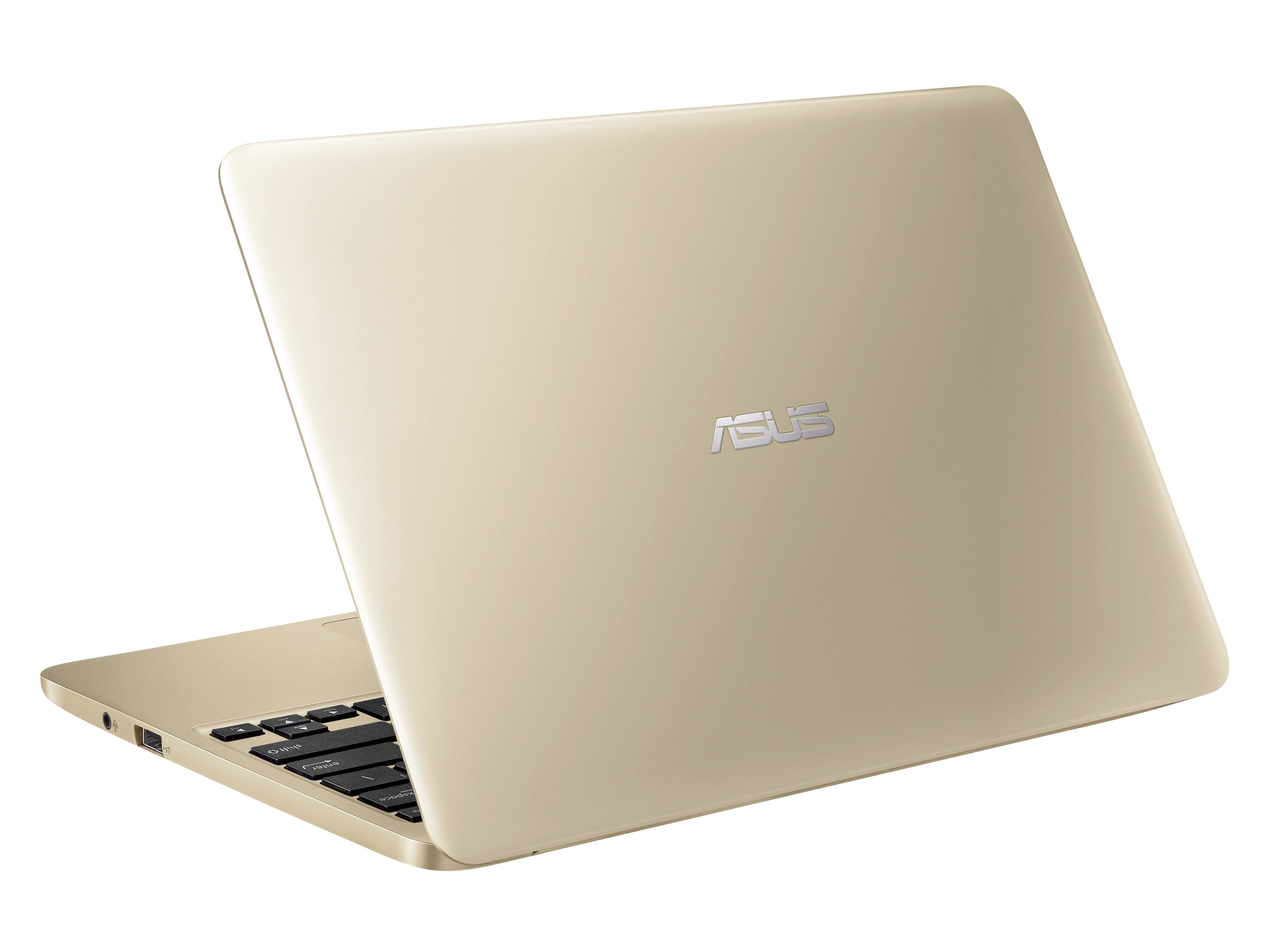 Ein geschlossener goldener ASUS Laptop steht auf einer weißen Oberfläche mit sichtbarem schwarzem Tastaturbereich.