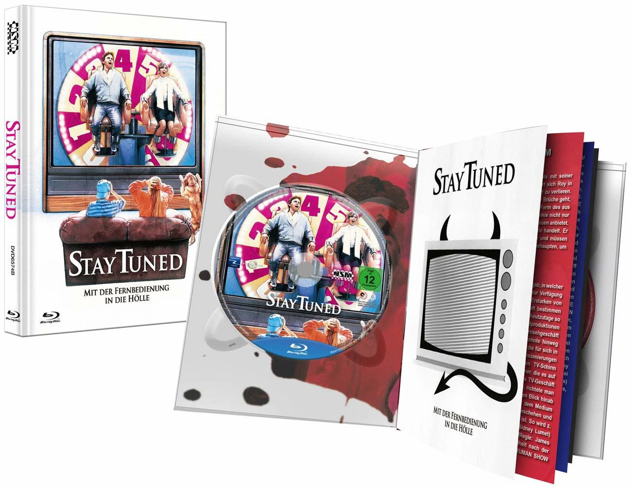 Stay Tuned DVD-Set. DVD-Hülle, geöffnet mit DVD und Broschüre.