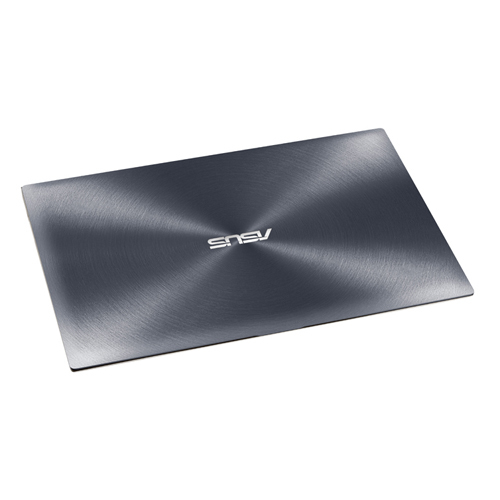 Geschlossener grauer ASUS-Laptop mit gebürsteter Metalloberfläche auf weißem Hintergrund.