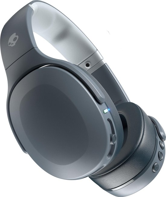 Szürke Skullcandy vezeték nélküli fejhallgató vezérlőkkel a fülkagylón és fehér fejpánttal.
