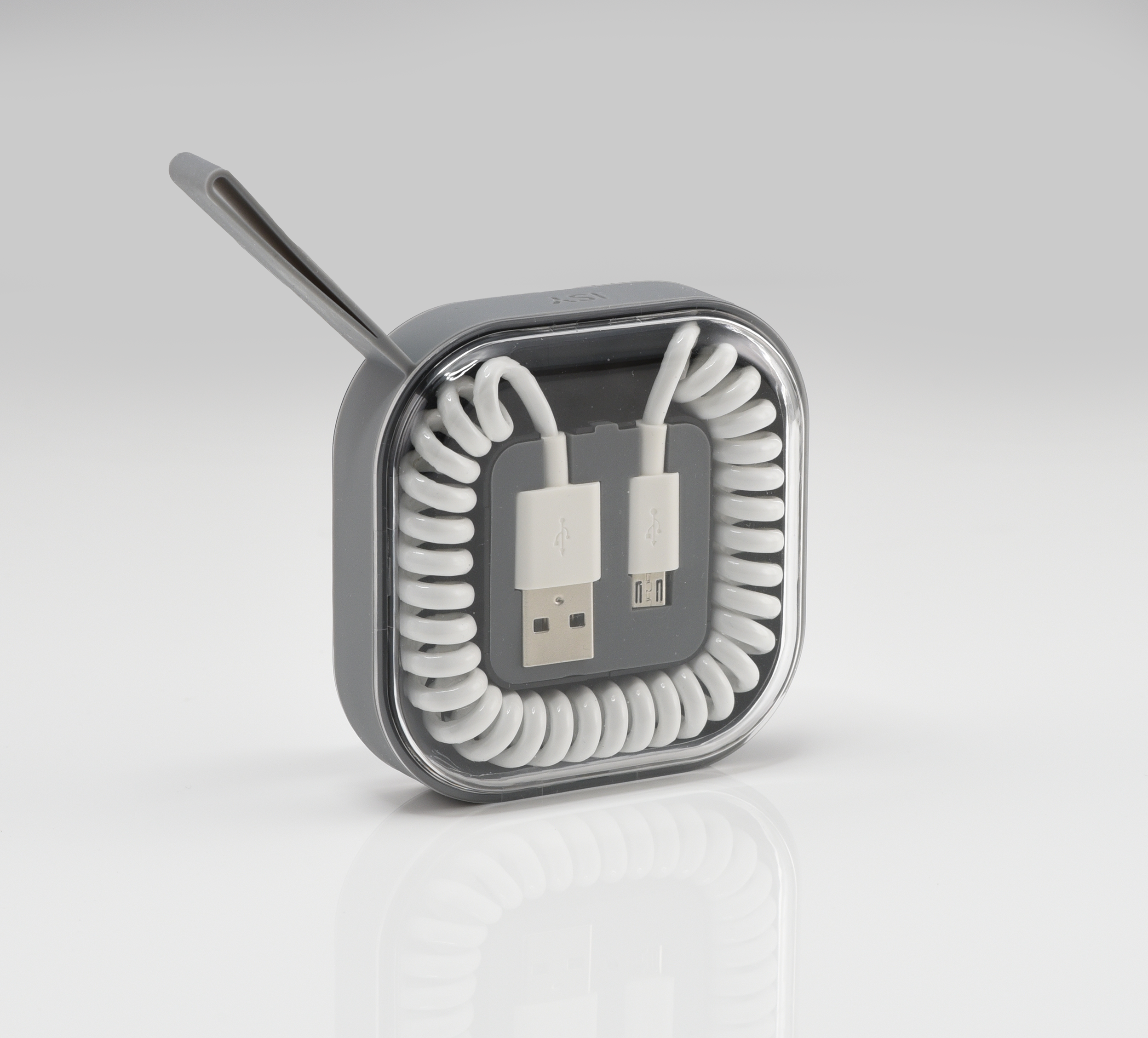 Grauer, quadratischer Kabelorganisator mit weißem, spiralförmigem USB-Kabel.