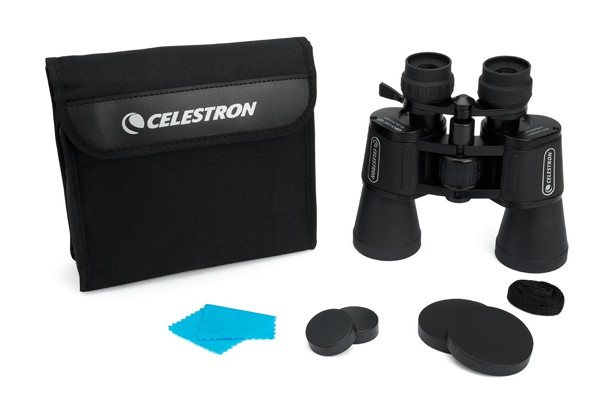 Black binoculars, case, cleaning cloth, and lens covers on a white background.