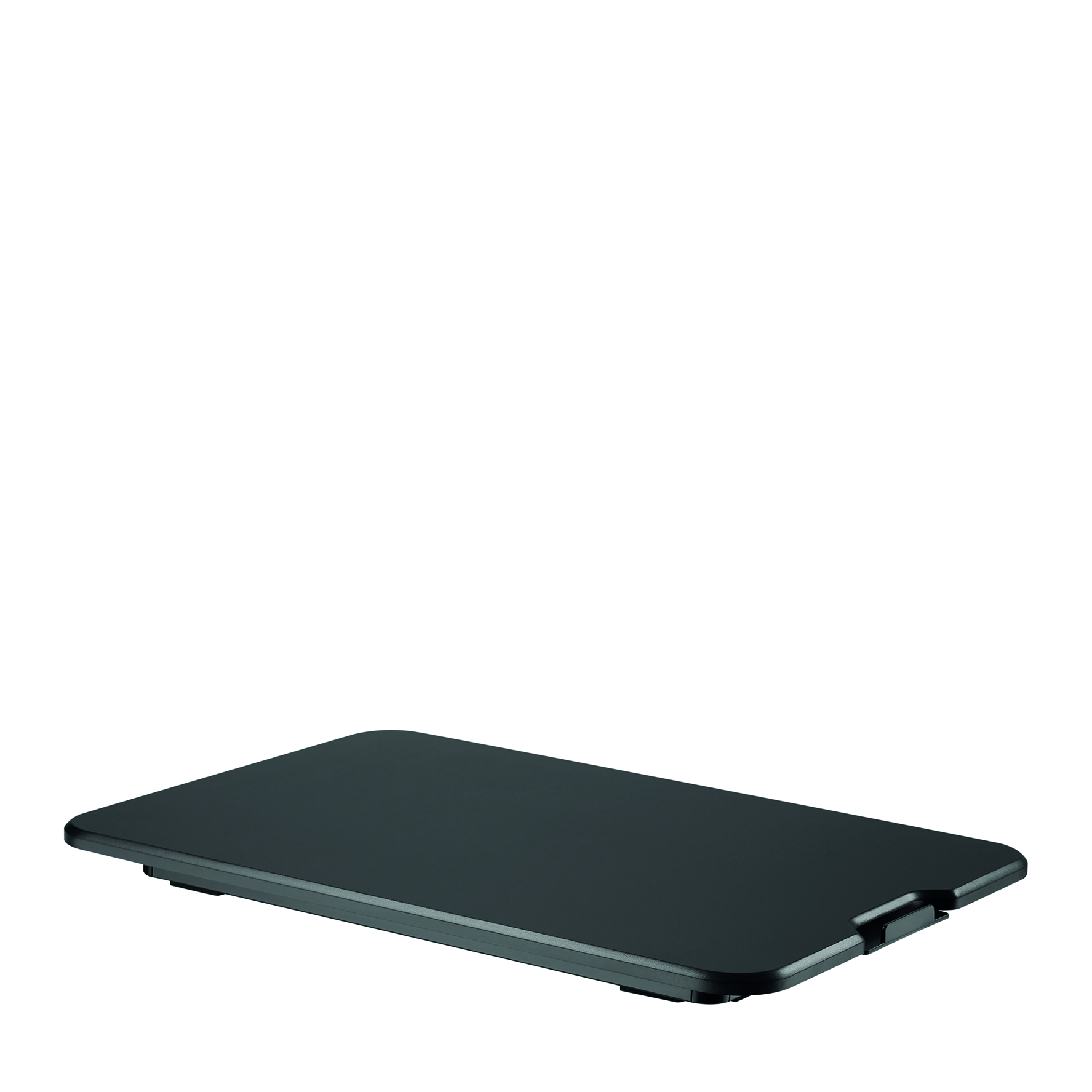 Black wireless charging pad on a white surface, with a small notch.