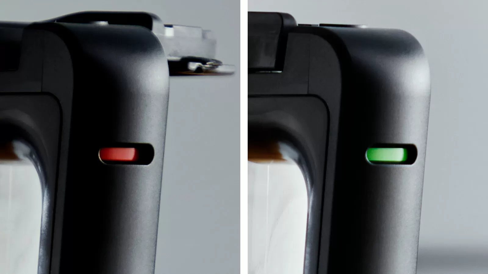 Close-up van een zwart apparaat met rode en groene lampjes die de stroomstatus aangeven.