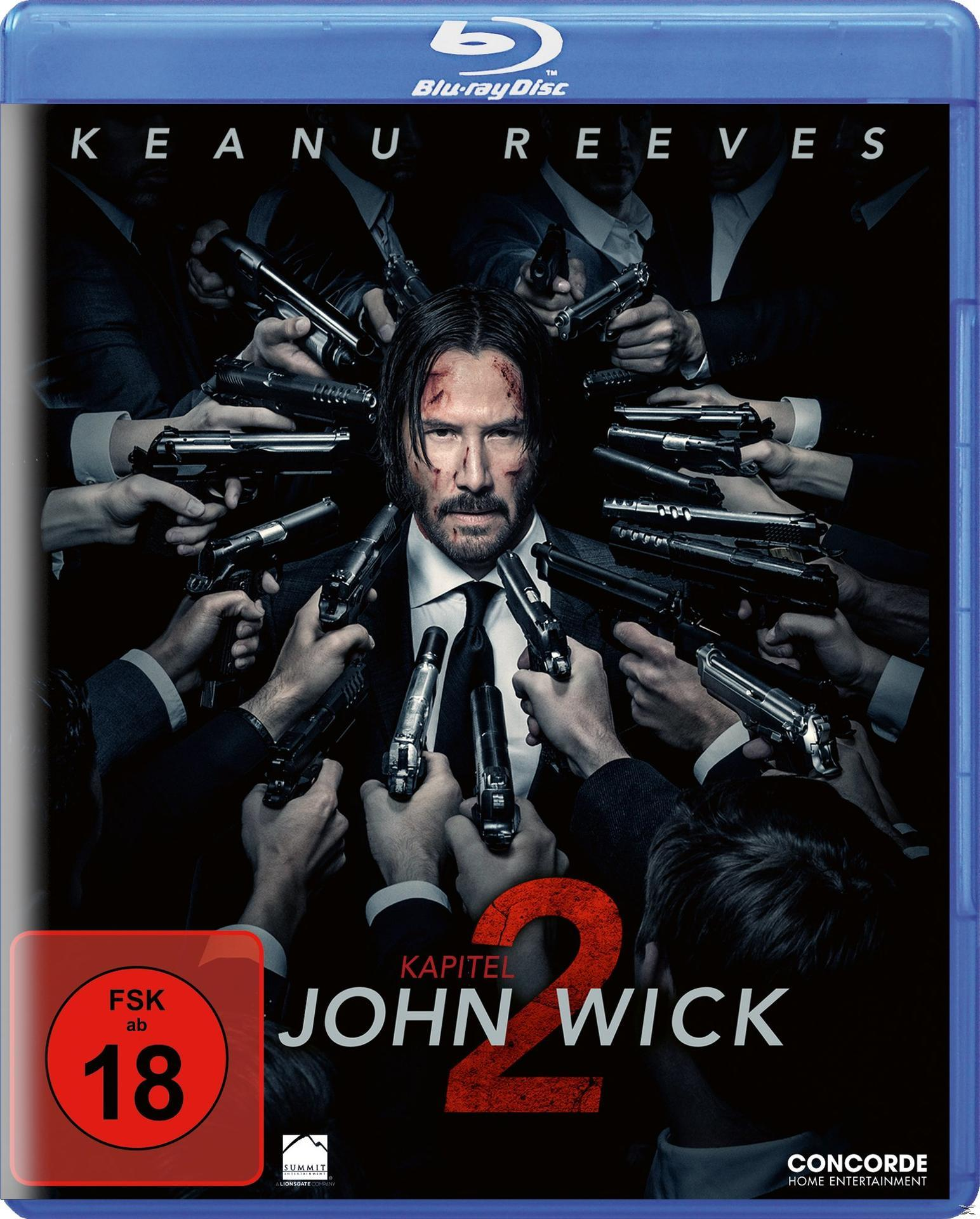 John Wick, umgeben von Händen mit Waffen. Blu-ray-Disc-Cover.