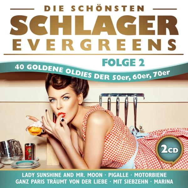 Albumcover mit einer Frau in rotem Kleid, in einer Küchenumgebung.