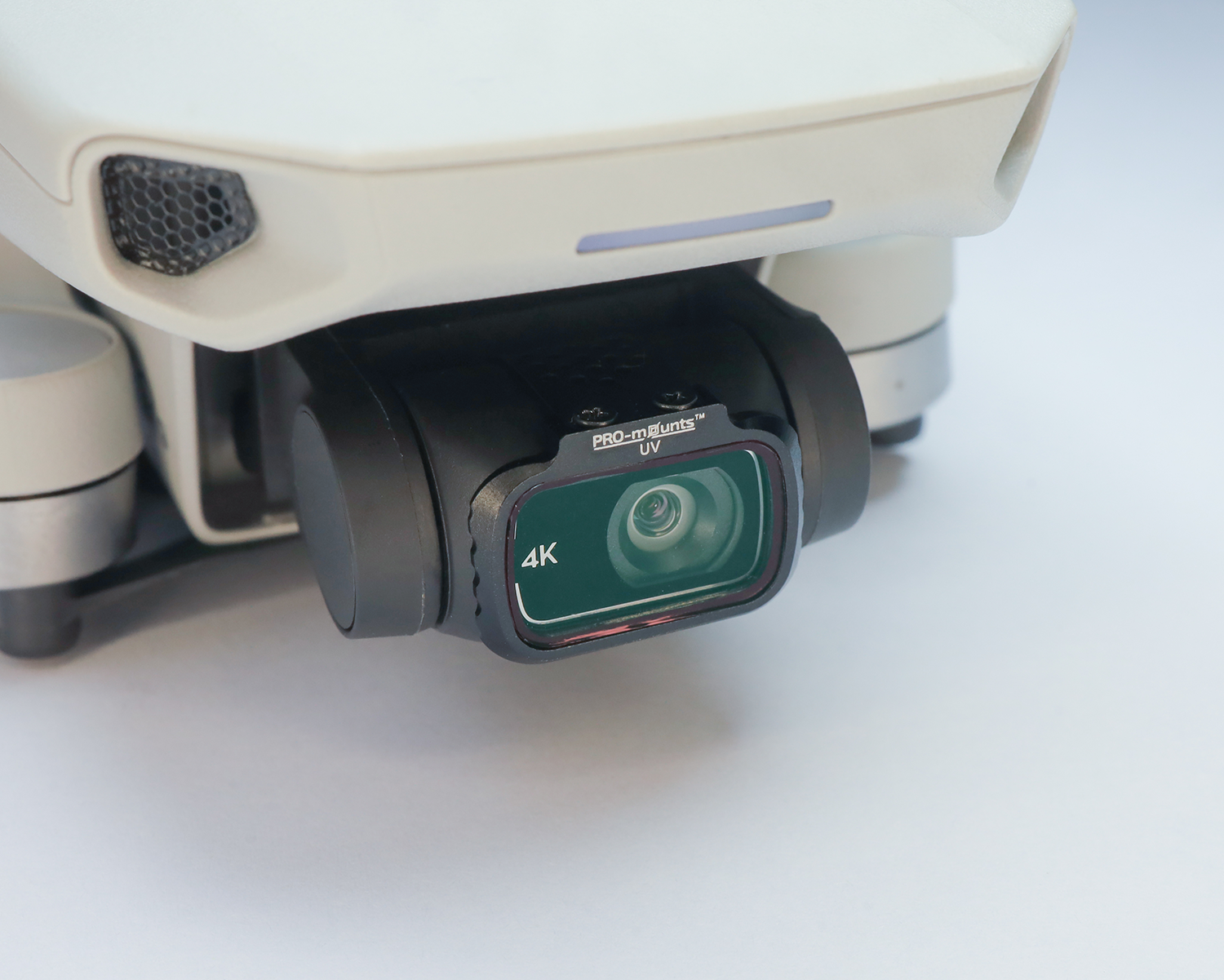 A drone with a 4K camera angled upwards.