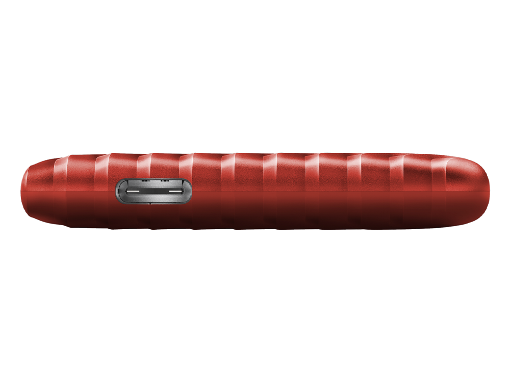 Disco duro externo rojo, acanalado, visto de lado, con puerto USB.