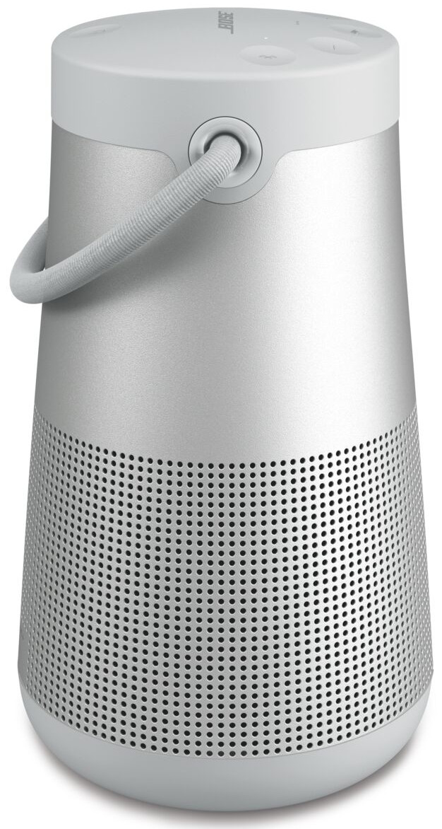 Een witte en zilveren hoge luidspreker met een handvat aan de bovenkant en een ronde voet.