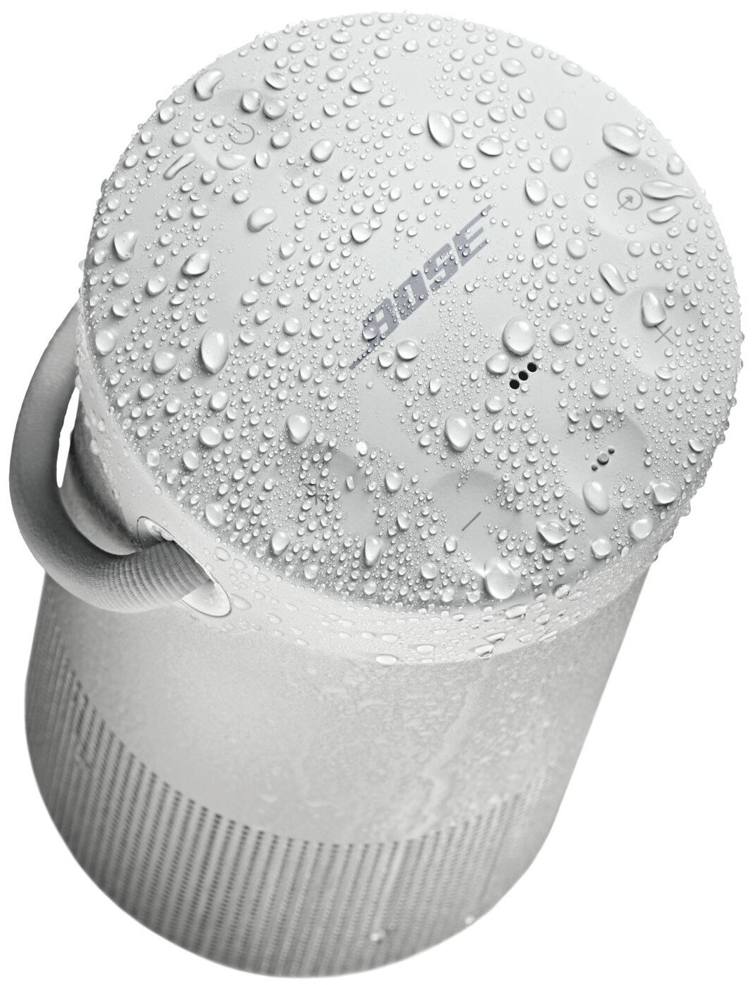 Witte, cilindrische Bose-luidspreker met waterdruppels erop.