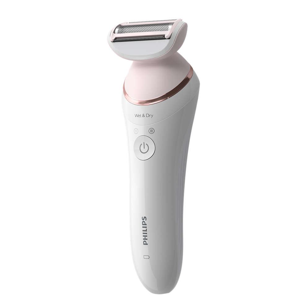 A white and pink Philips electric shaver on a white background.