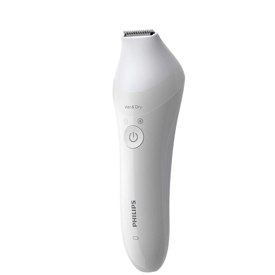 White Philips trimmer with a rounded body. It has a power button and a trimming blade at the top.