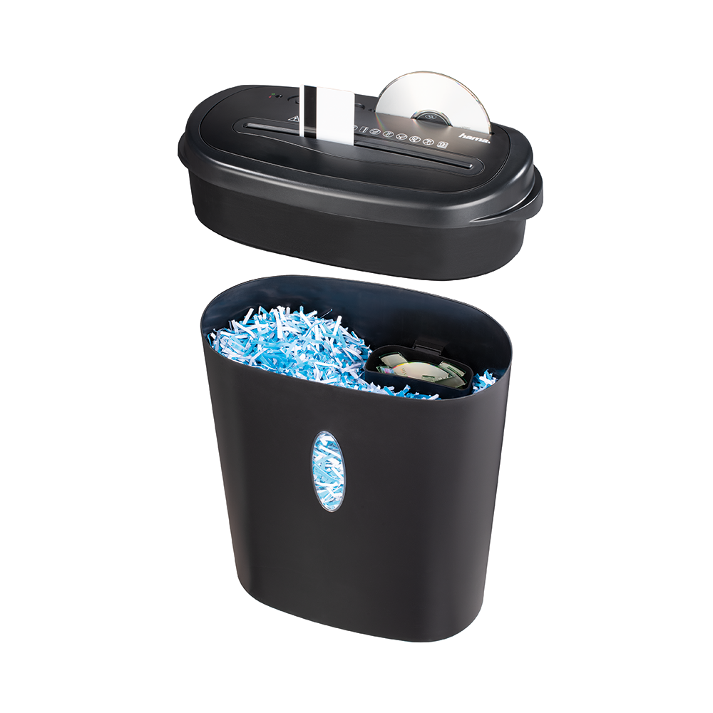 A black paper shredder with shredded paper and a CD, separated into two parts.