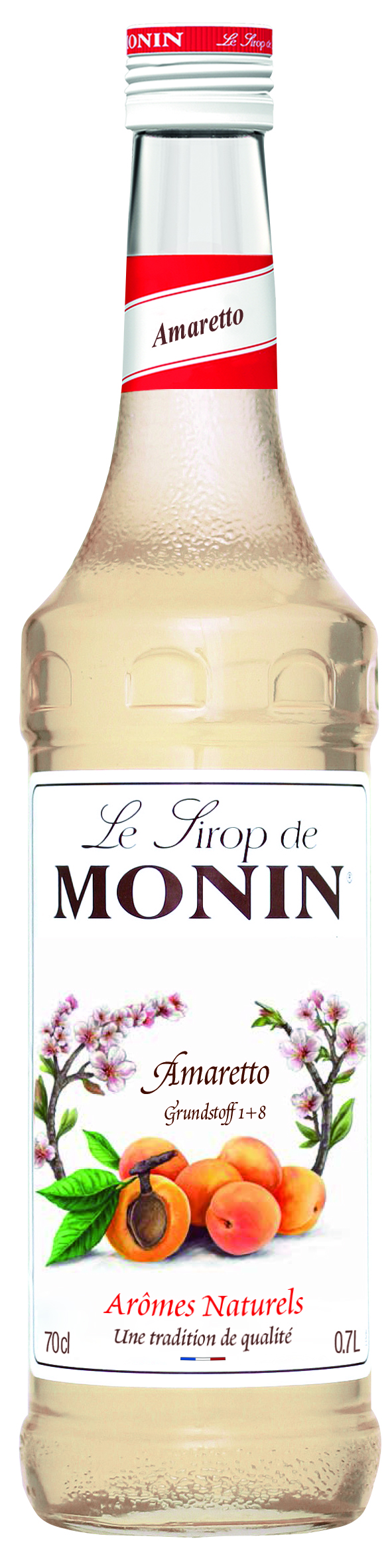 Monin Amaretto Sirup Flasche. Weißes Etikett mit Text und einem Bild von Aprikosen und Blüten. 0,7L.