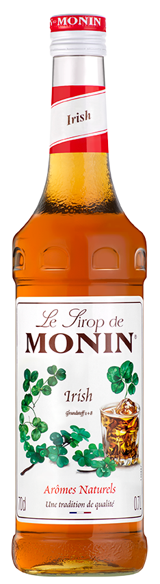 Monin Irish Sirup Flasche. Braune Flüssigkeit. Etikett: Irish, Aromes Naturels, Une tradition de qualité.