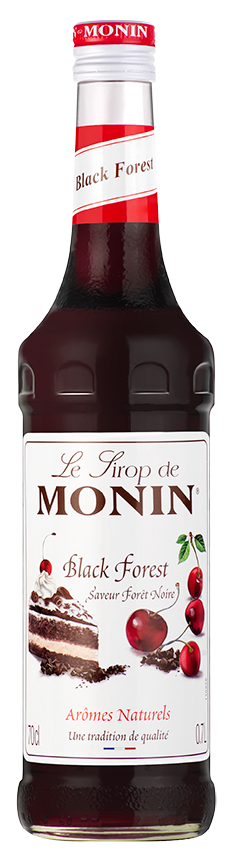 Monin Black Forest Sirupflasche. Sie zeigt einen Kuchen mit Kirschen und den Markennamen.
