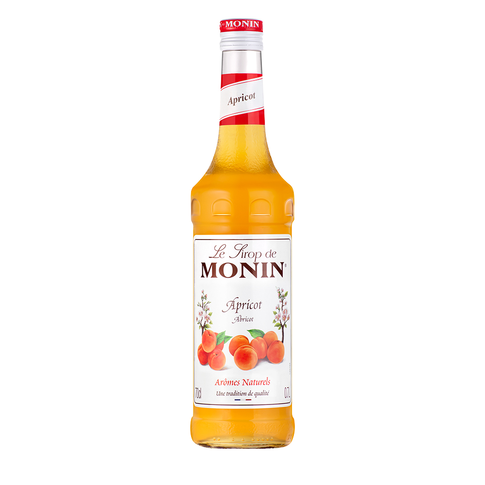 Aprikosensirup-Flasche mit Etikett, das Aprikosenfrüchte und Text zeigt.