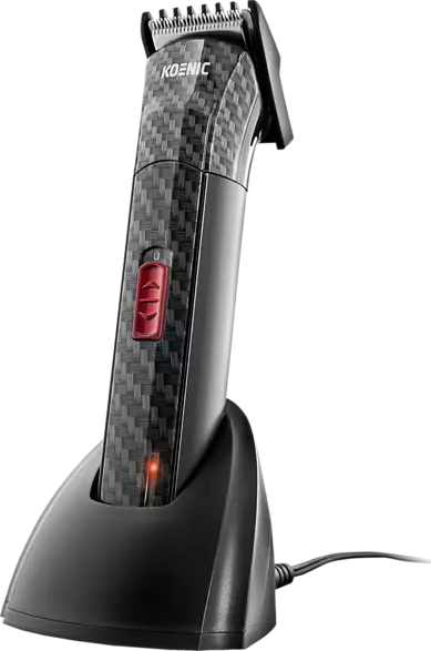 Tondeuse à cheveux Koenic noire sur socle de charge. Bouton rouge d'alimentation visible.